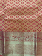 Luxury Silk Blend Kanchipuram Pattu | Orange | Flower Butta Body | Grand Border & Pallu