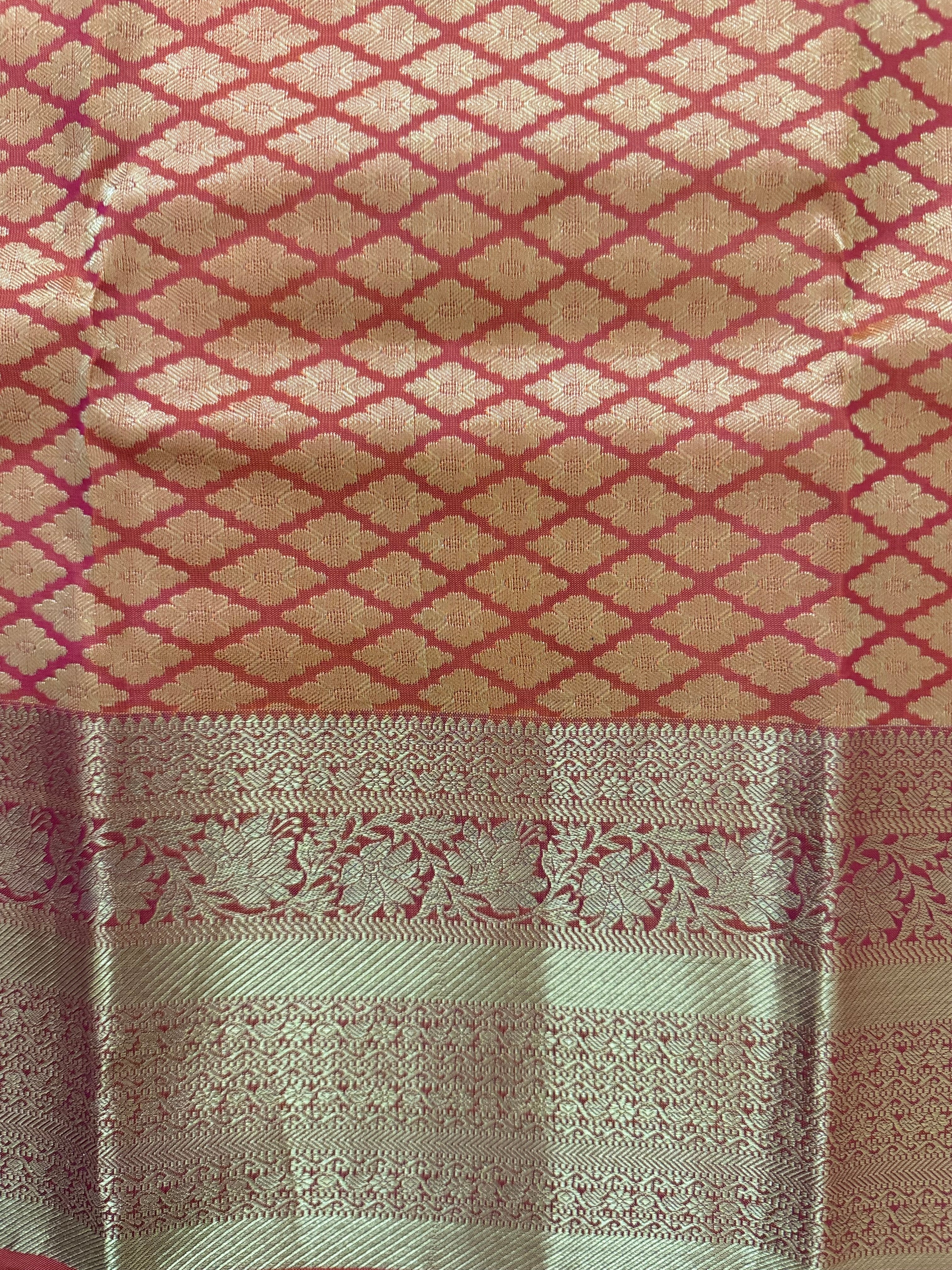 Luxury Silk Blend Kanchipuram Pattu | Orange | Flower Butta Body | Grand Border & Pallu