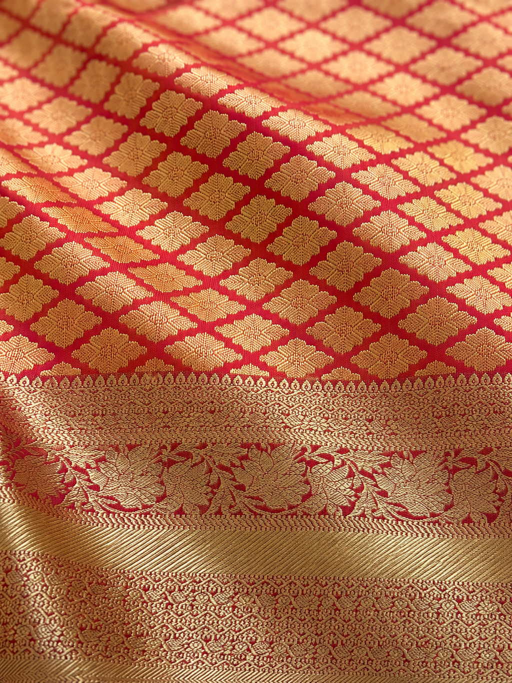 Luxury Silk Blend Kanchipuram Pattu | Orange | Flower Butta Body | Grand Border & Pallu